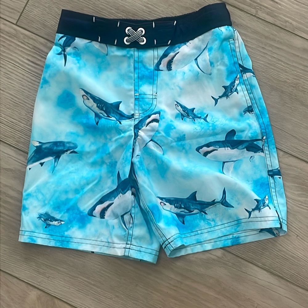 Size medium 8 shark swimming trunks